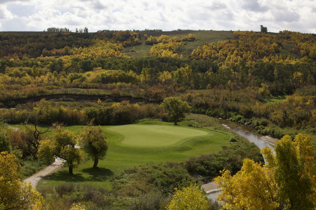 View from top of a hill looking at a green at Deer Valley Golf Course