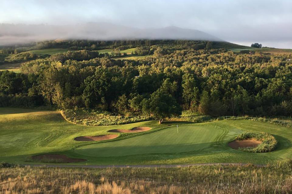 View from top of a hill of a hole at Katepwa Beach Golf Course