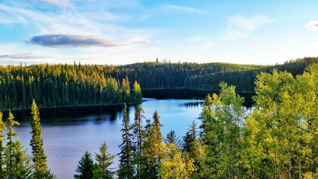 Gem lakes of Narrow Hills Provincial Park surrounded by dense boreal forest late evening